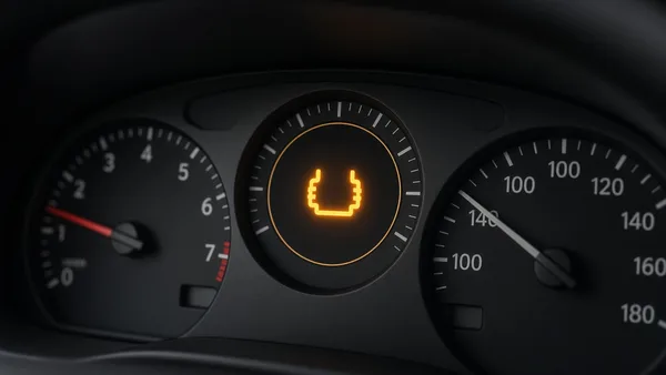 Foto lampu indikator berbentuk spiral menyala di panel instrumen mobil diesel